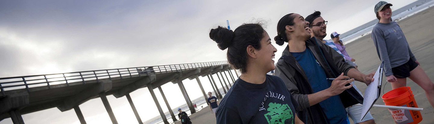 Photo of UC San Diego students in a class near Scripps Pier.