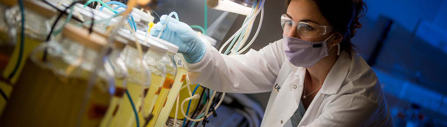 UC San Diego climate change researcher working in a lab.